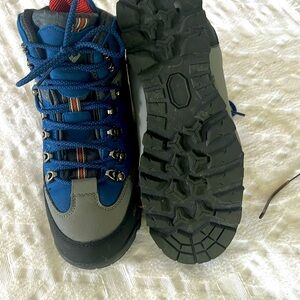 100% water proof, durable, light weight. Reinforced toe. Rugged out sole.